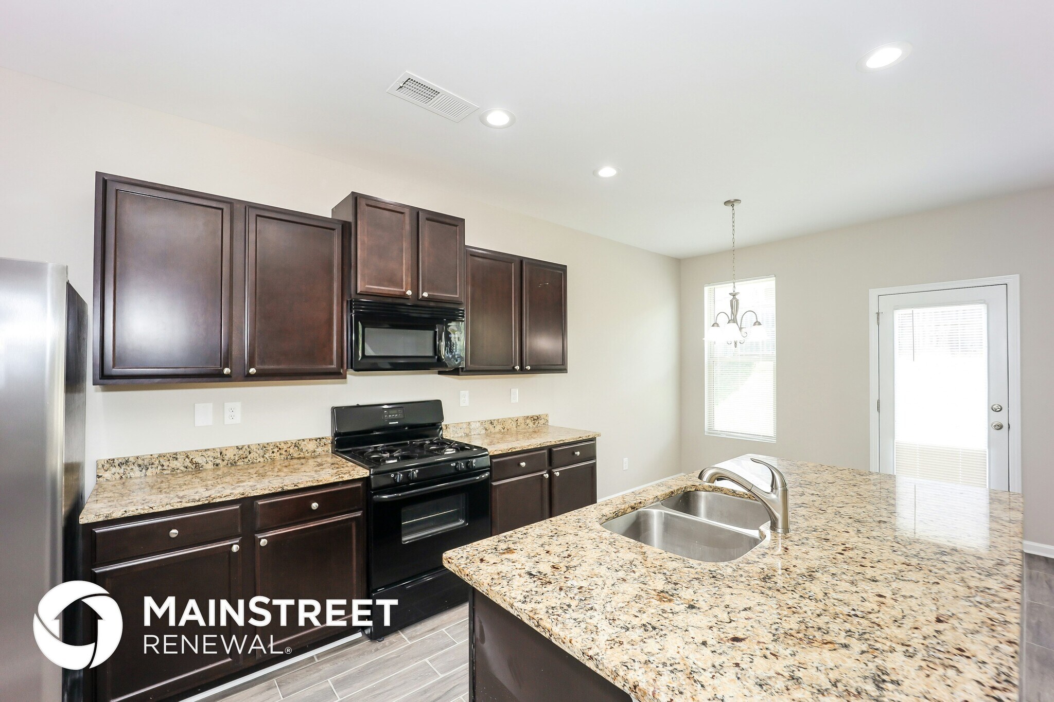 Building Photo - 6372 Woodwell Dr