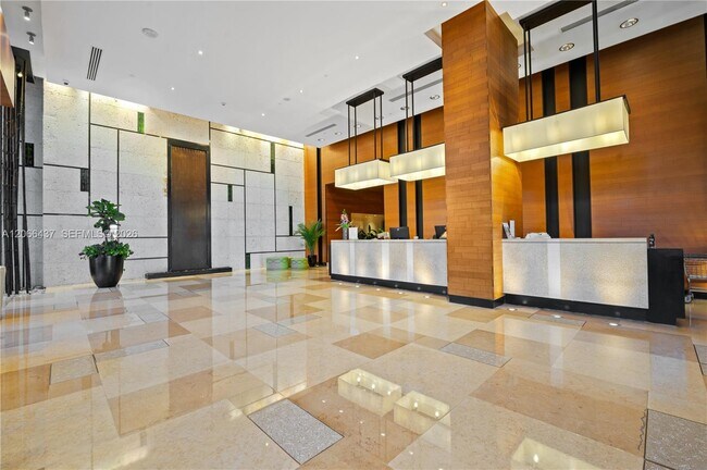 Building Photo - 6899 Collins Ave