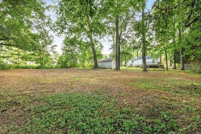 Building Photo - Adorable Home, Just Painted, Wood Flooring...