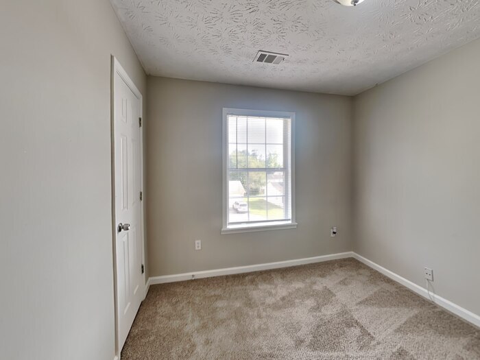 Building Photo - 6156 Raleigh Oaks Ct