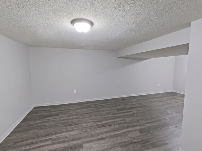 Building Photo - Spacious 3-Bedroom Home with Garage, Finished Basement & Fenced Yard