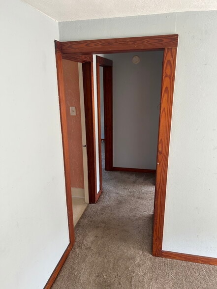 Hallway to bathroom and bedrooms. - 525 Church St