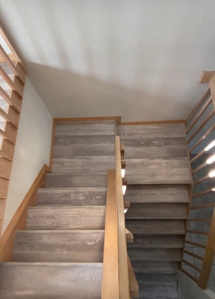 New flooring staircase - 2590 Sykes Creek Dr