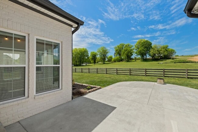 Building Photo - unning custom-built home on a full acre in...