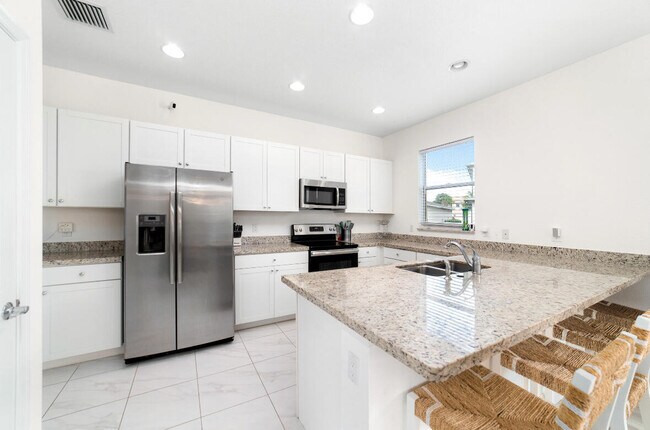 Building Photo - 2011 NW Cataluna Cir