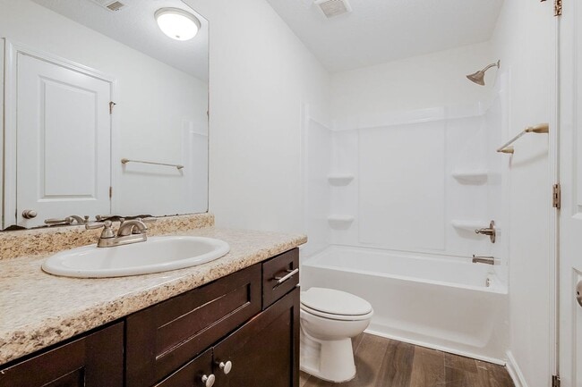Building Photo - Spacious 3BR Townhome with Main-Level Primary Suite