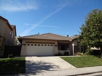 Building Photo - SINGLE STORY, 3 BEDROOM, 2 BATH, 2.5 CAR GARAGE, IN GATED COMMUNITY!