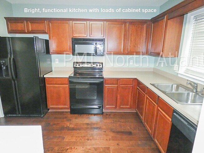 Building Photo - Now Available – Stunning 2-Bedroom Townhom...