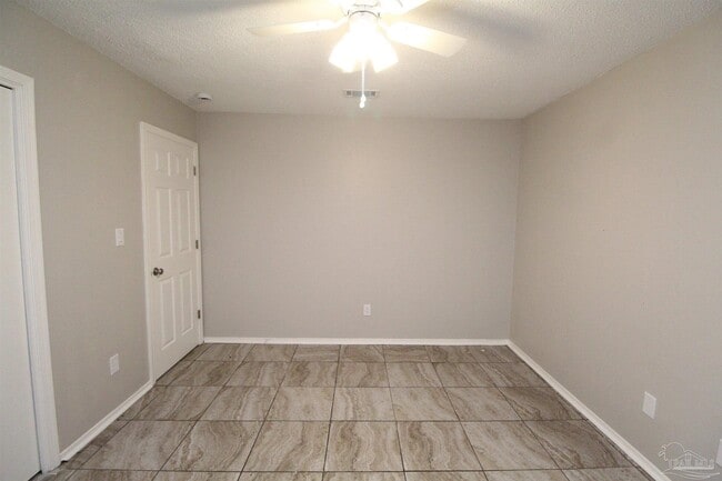 Building Photo - 6810 Tiki Ln