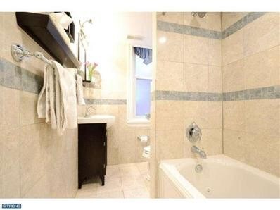 Spa-like Jacuzzi, tumble stone bathroom - 250 S 23rd St