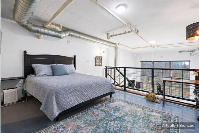 Building Photo - Urban Loft Condo Featuring Stunning Views & Rooftop Entertaining