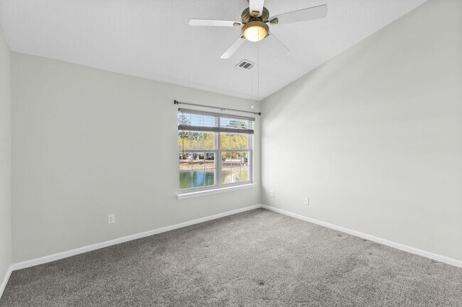 Building Photo - Charming Townhome with Water Views near The Market Common!