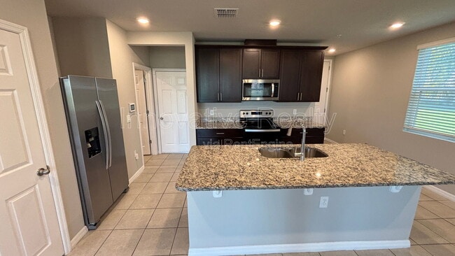 Building Photo - 1061 Desert Candle Dr