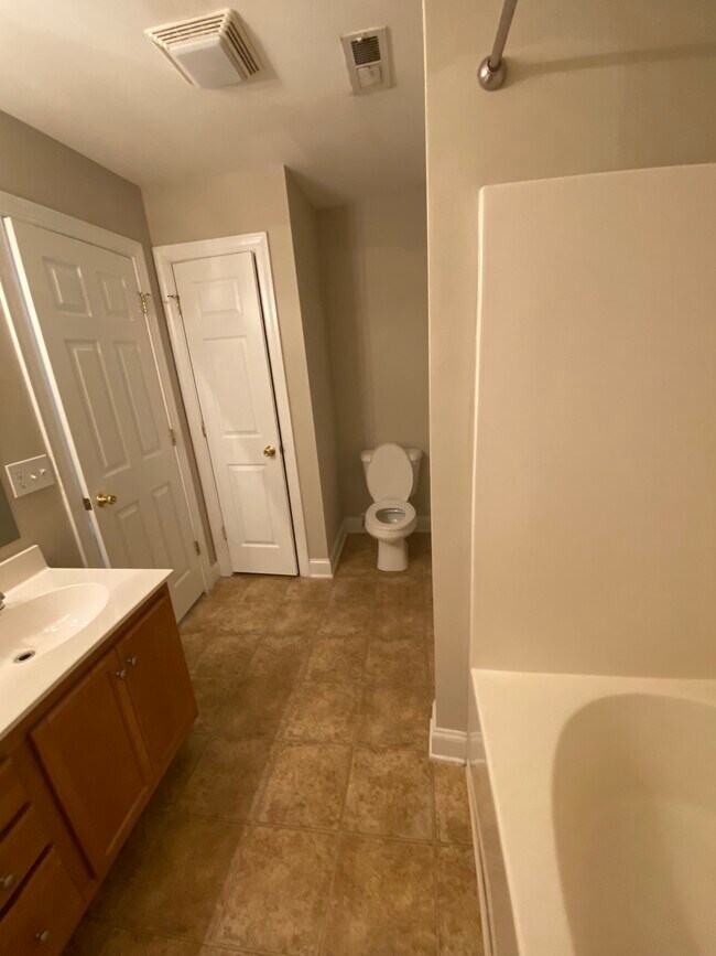 Master bathroom also has another closet. - 137 High Ridge Rd