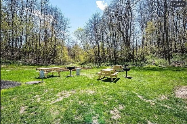 Building Photo - Price Improvement! $1500 Hot Water Included | Looking for the perfect studio in Dover with a pool...