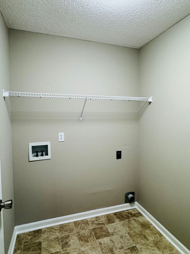 Building Photo - Your new home is just a putt away with thi...