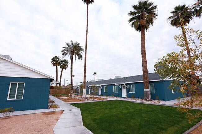 Building Photo - Boutique Living Meets Private Backyards an...