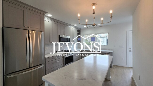 Building Photo - Coming soon! Charming White Bungalow with Modern Upgrades in the Heart of Yakima