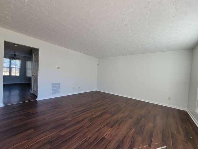 Building Photo - Experience modern living in this stunning two-story townhome! Awesome School District