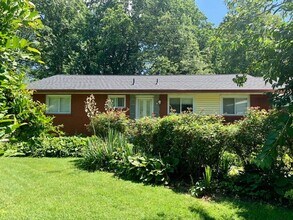 Building Photo - Light filled 2 BR plus 2 rooms, 2 FB including one in finished basement. Great location