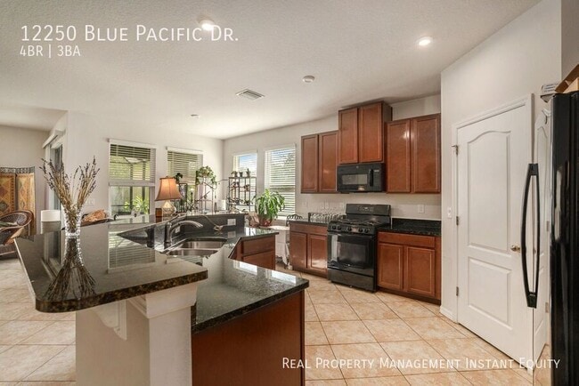 Building Photo - 12250 Blue Pacific Dr