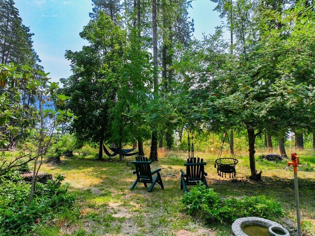 Building Photo - 2700 + sq ft family home has it all! Over 2 acres of land and a stunning view of Lake Pend Oreille