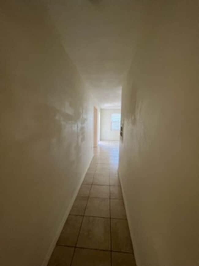 Building Photo - Main House (Triplex) can add one studio for additional rent (mother-in-law plan)