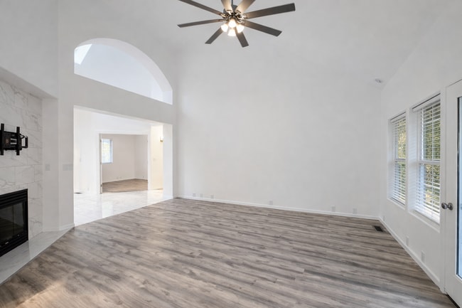 Building Photo - Executive 3 Bed Home with 3 Car Garage & Private Fenced Yard