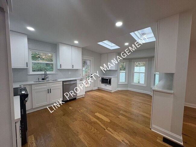 Building Photo - JUST REDUCE!  Sophisticated Tri-Level Home in Stuart Heights — Modern Comfort & Timeless Charming...