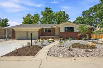 Building Photo - AVAILABLE NOW

Spacious 4-Bedroom Wheat Ridge Home with Finished Garden Level, Two-Car Garage & B...