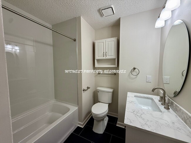 Building Photo - Spacious 3 Bedroom Home with Finished Basement, Covered Deck & Fenced Yard