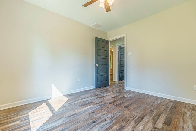 Building Photo - Spacious Four-Bedroom Two-Bath Home on One...