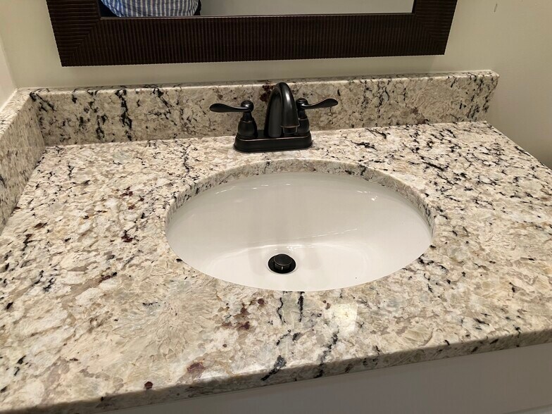 Elegant granite countertop - 104 E Poplar St