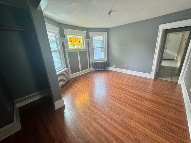 Building Photo - Stunning Renovated 4-Bedroom Home Near Dow...