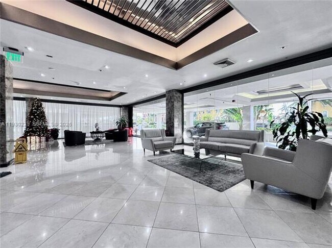 Building Photo - 8877 Collins Ave