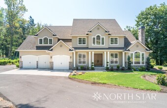 Building Photo - Executive Custom Home with River View on A...