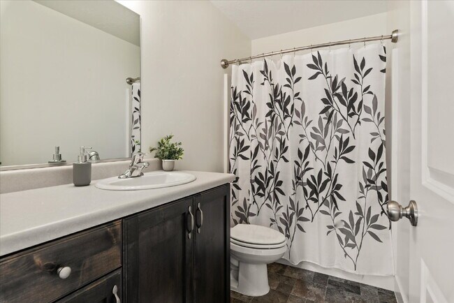 Building Photo - "Spacious 4-Bedroom Townhouse Retreat on S...