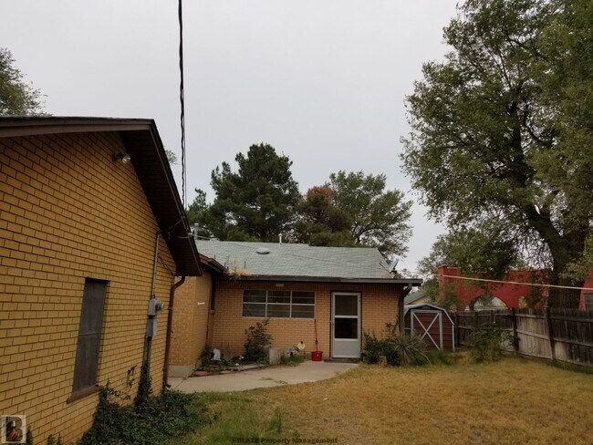 Building Photo - Massive Corner-Lot Home with Retro Charm & Shady Backyard!