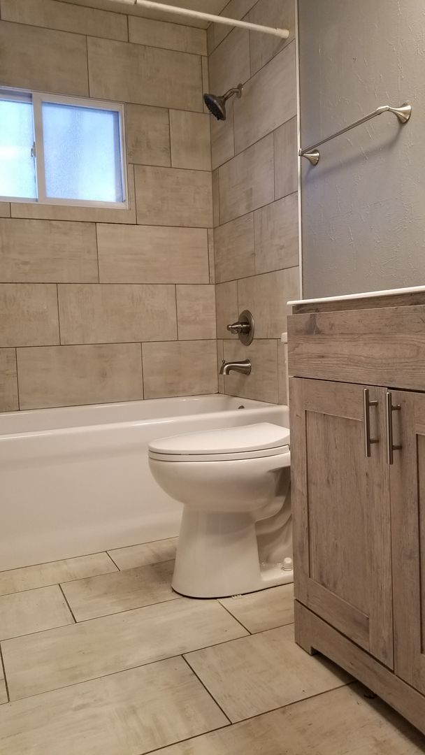 Building Photo - NE 3 bedroom updated with appliances and garage