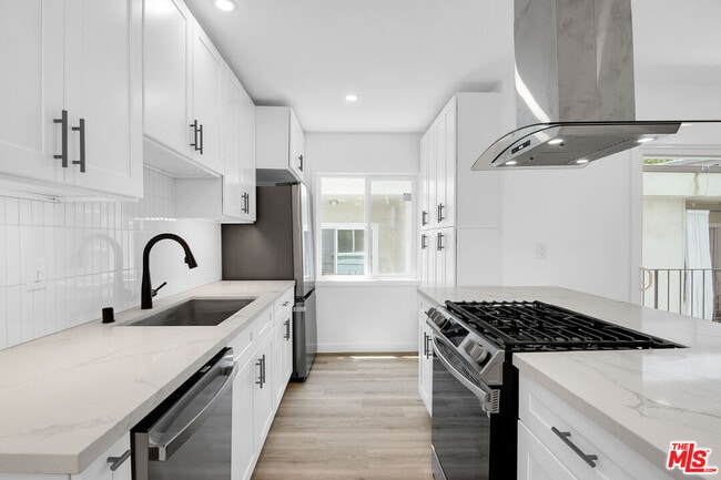 Building Photo - 1021 N Genesee Ave