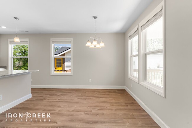 Building Photo - Bright and Modern: New Construction Three-...