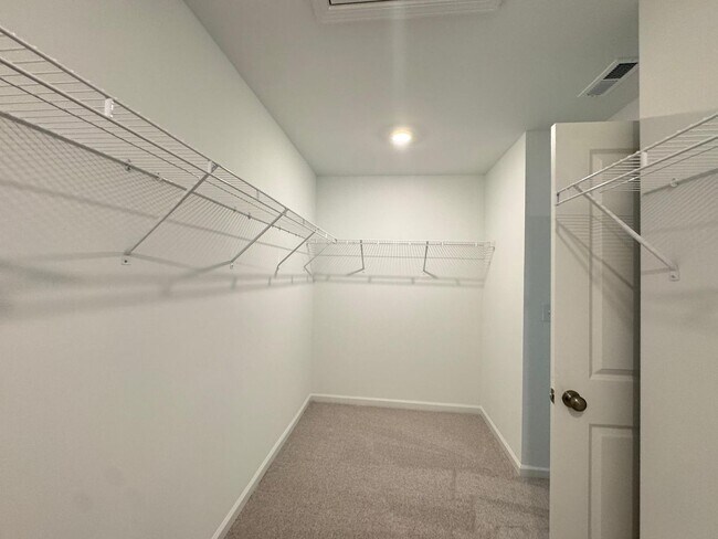 Building Photo - BRAND NEW GORGEOUS TOWNHOUSE in a very con...
