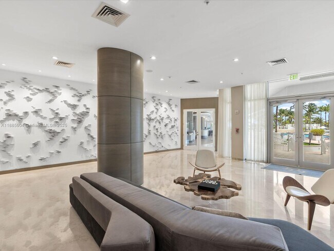 Building Photo - 10275 Collins Ave