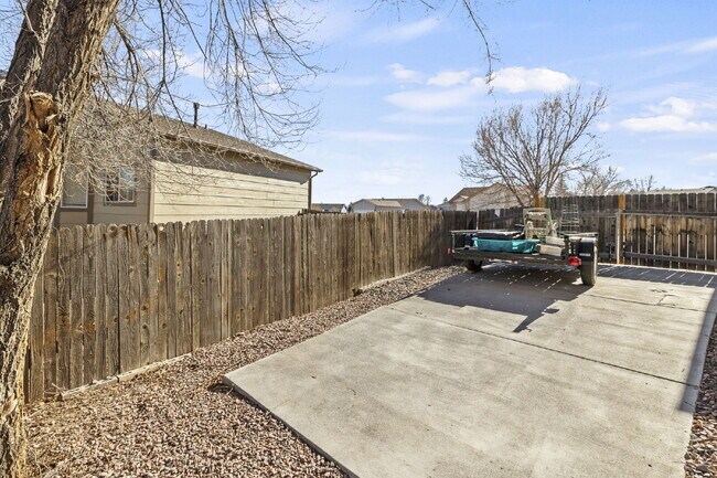 Building Photo - Spacious Home with Finished Basement, Granite Kitchen & Fenced Yard Near Fort Carson