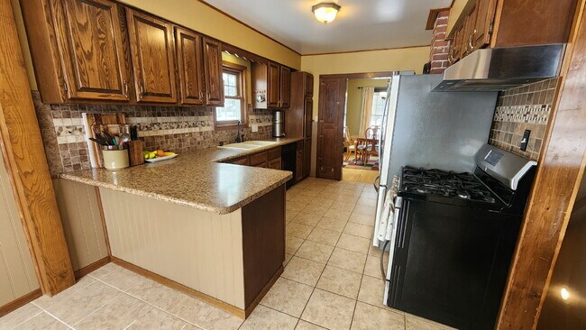 Building Photo - 4-Bedroom, 2 Bathroom Easthill Home with Bonus Room, Finished Lower Level, and Garage