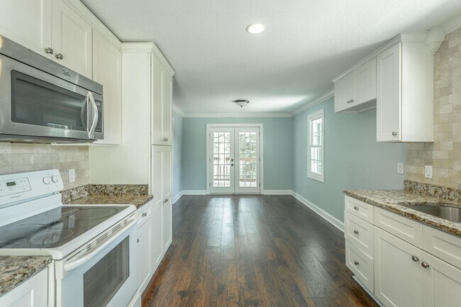 Building Photo - Charming Family Haven: 3 Bedroom Gem with Inviting Outdoor Space