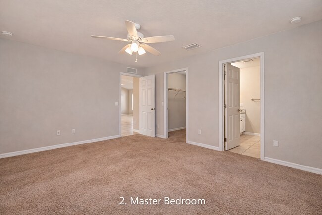 Building Photo - Spacious Three-Bedroom Home with Open Floor Plan, Large Yard & Screened Patio