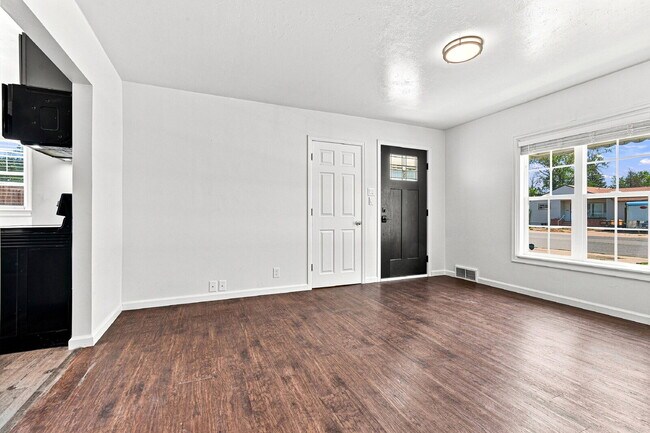 Building Photo - $1,545.95, 2-bed, 1-bath home in Brighton with a large fenced backyard.
