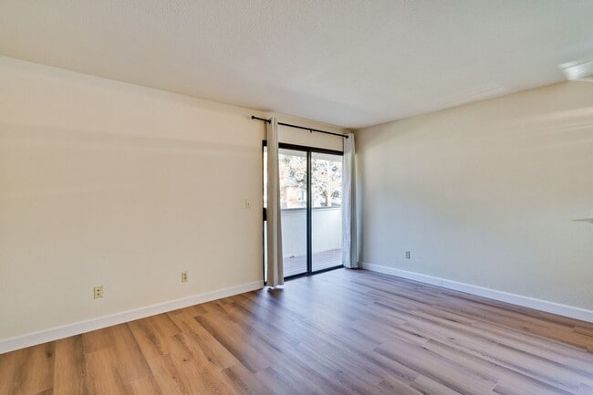 Building Photo - New Vinyl Plank Flooring, Fresh Interior Paint, 1 Car Garage + 1 Assigned Outdoor Parking Space -...