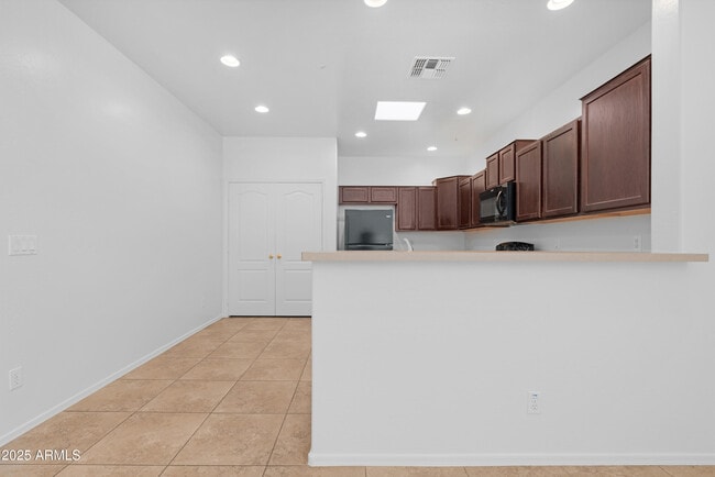 Building Photo - 8940 W Olive Ave